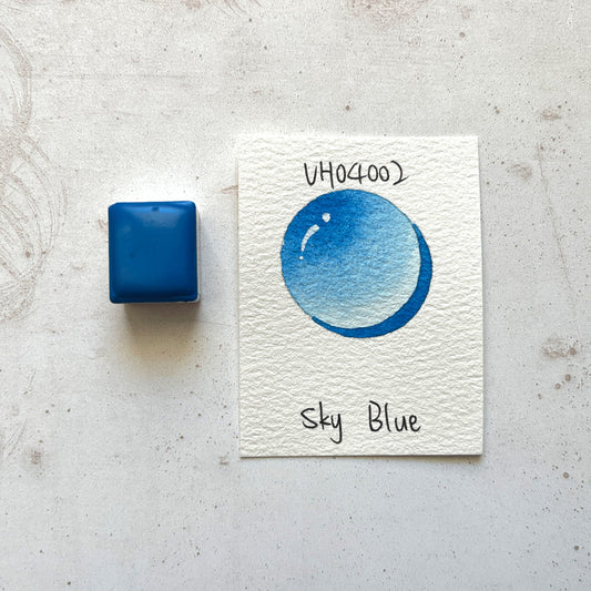 Aquarellfarbe mit Honig Himmelblau